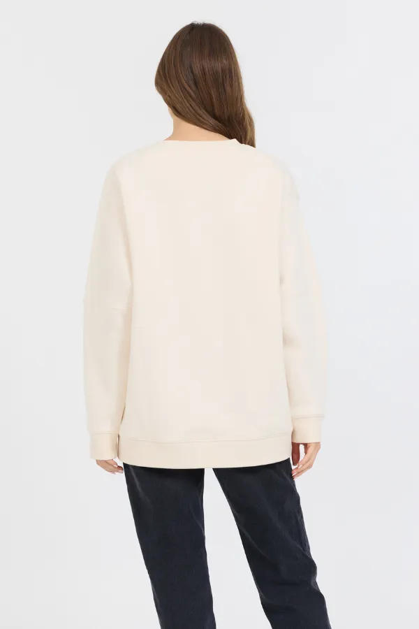Creme mit königsblau gefärbtem Fleece-Crew mit Glitzerdruck