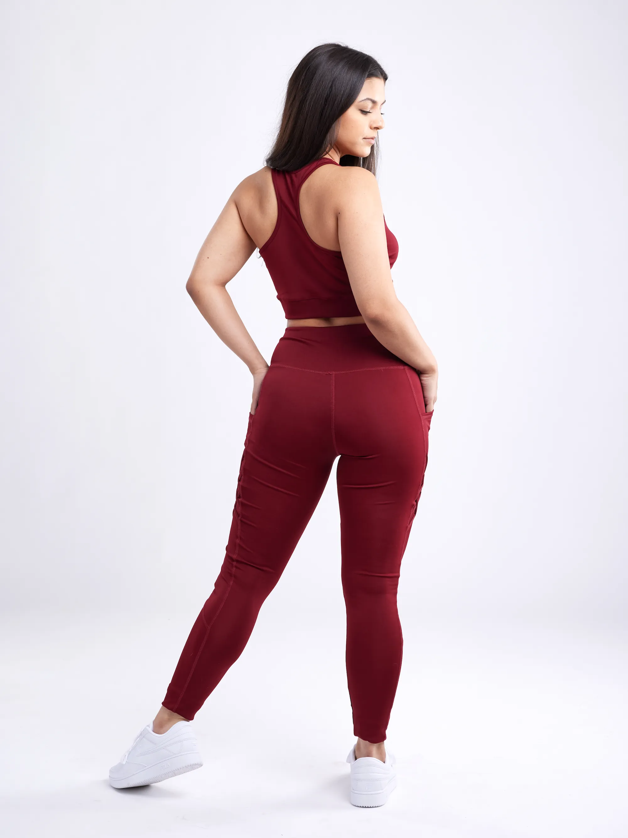 Hochtaillierte Criss-Cross-Trainingsleggings mit Hüfttaschen