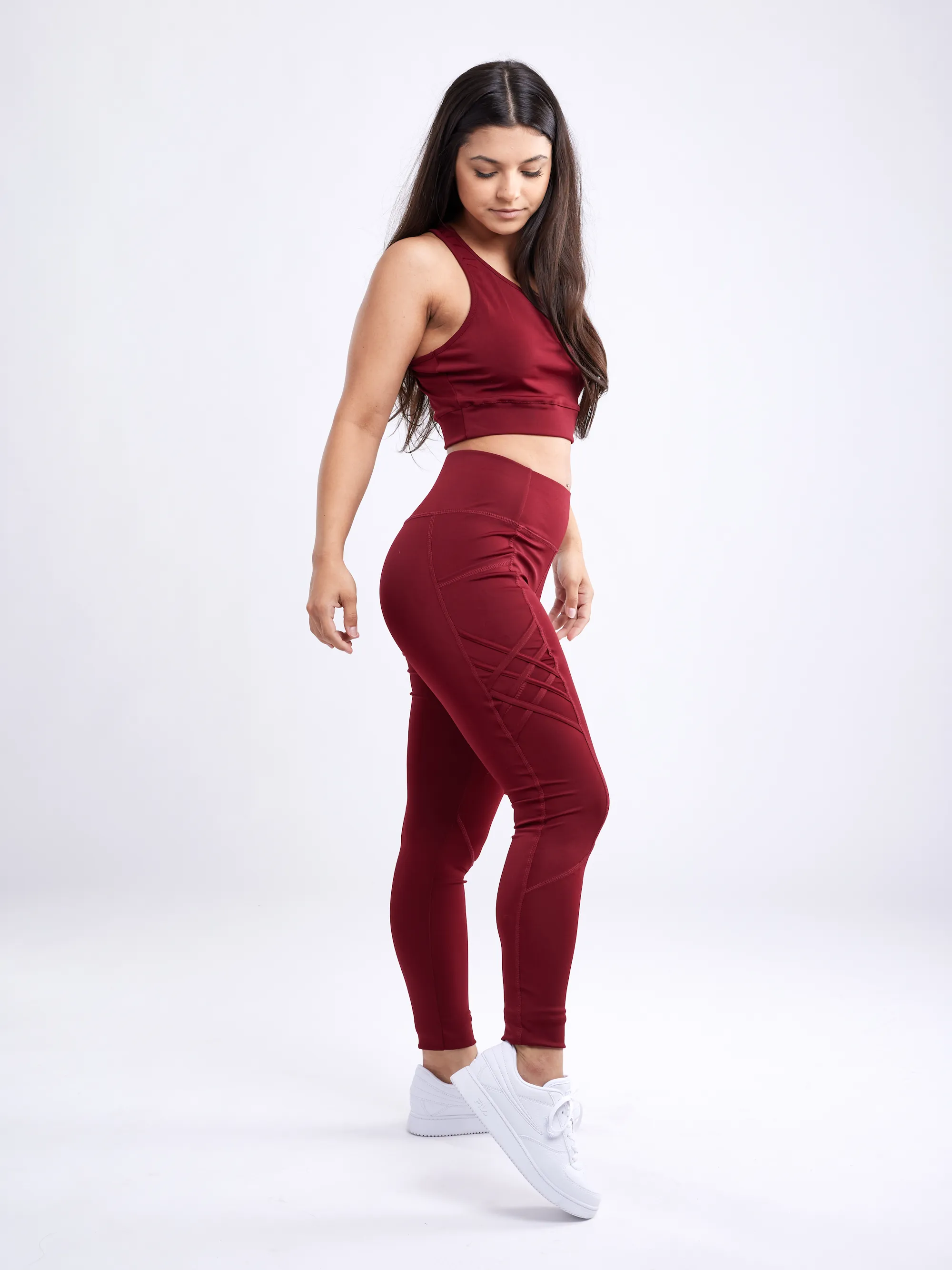 Hochtaillierte Criss-Cross-Trainingsleggings mit Hüfttaschen