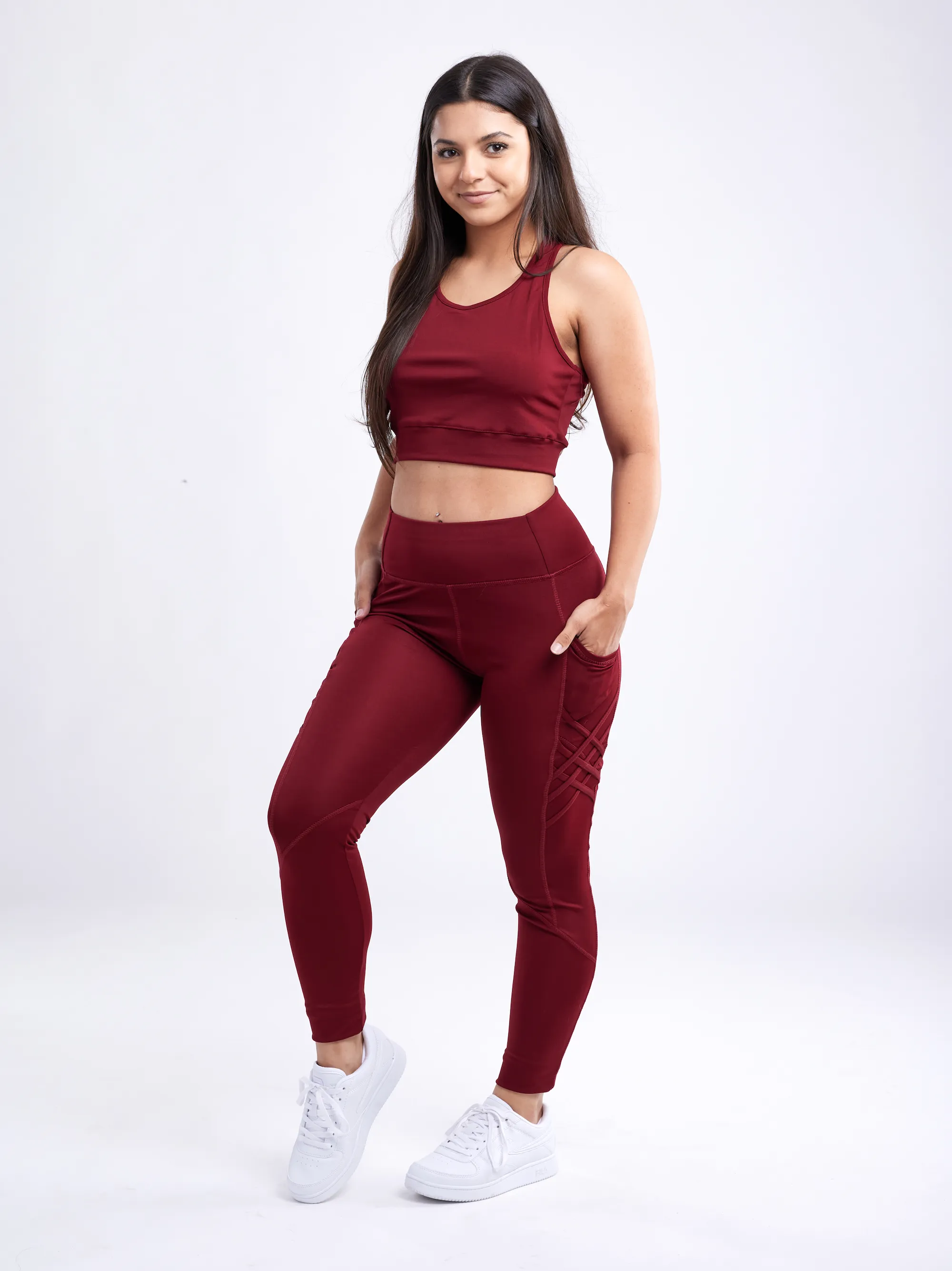 Hochtaillierte Criss-Cross-Trainingsleggings mit Hüfttaschen