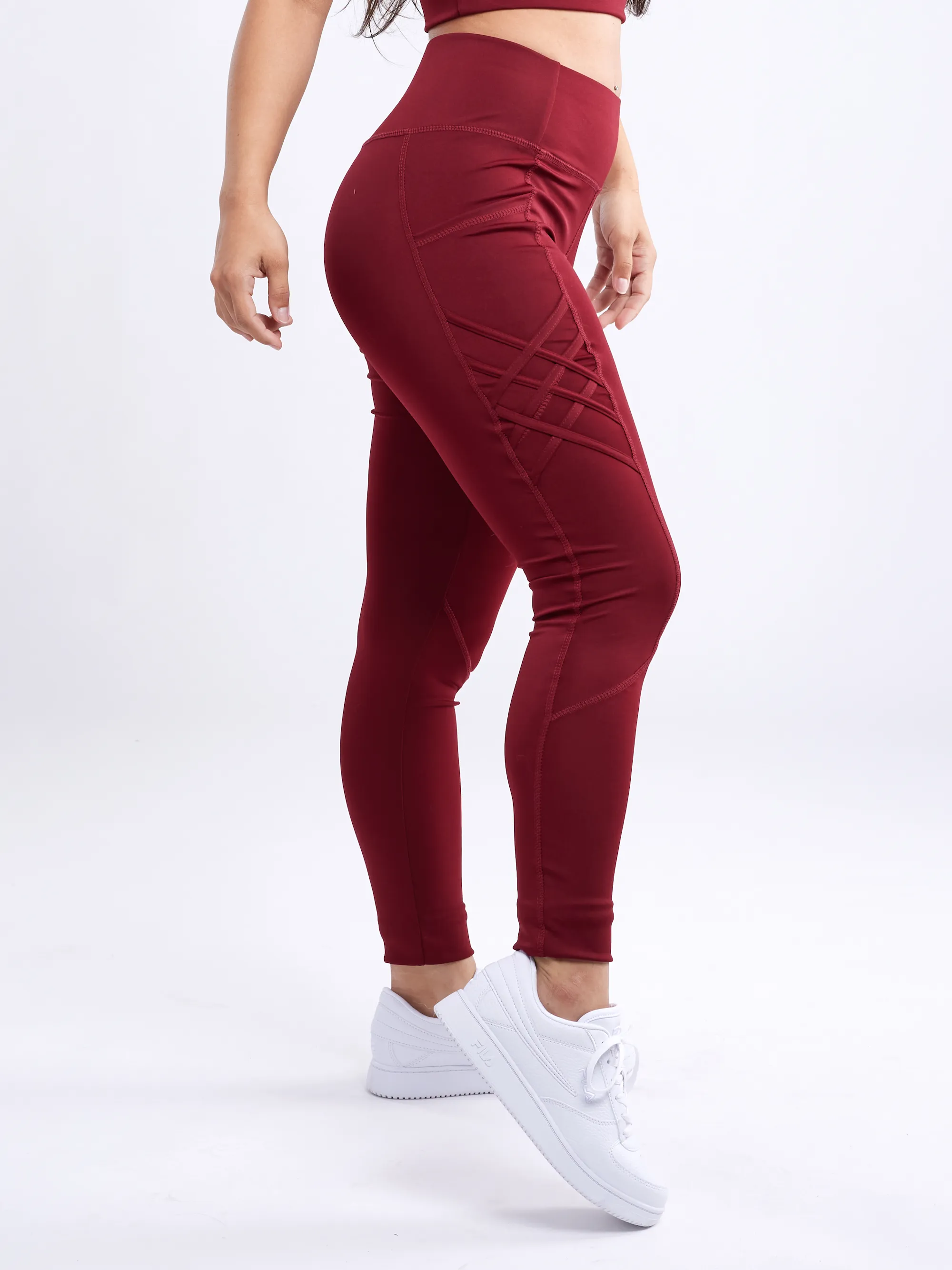 Hochtaillierte Criss-Cross-Trainingsleggings mit Hüfttaschen