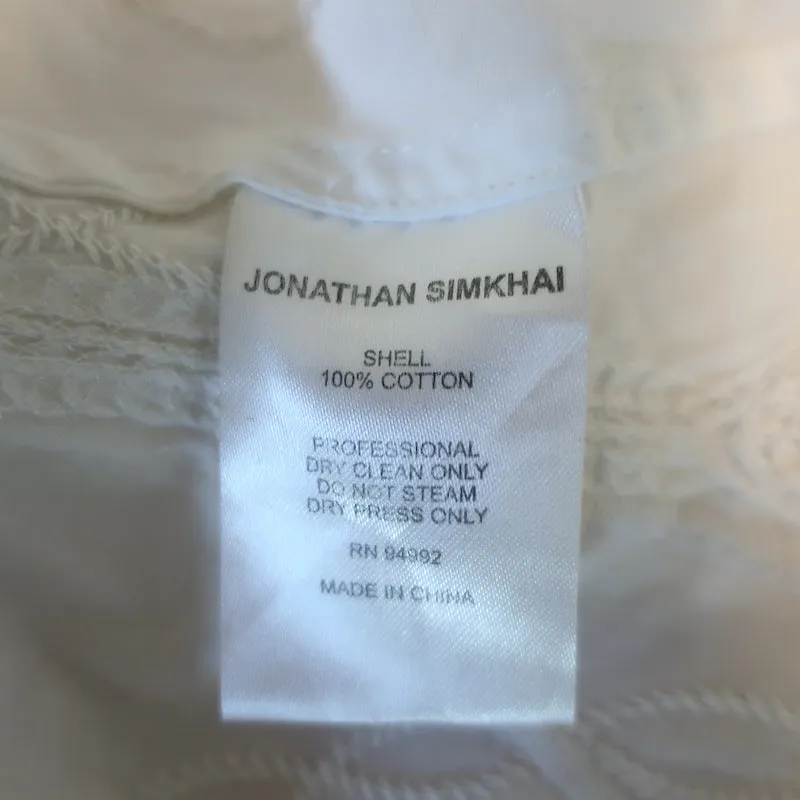 Jonathan Simkhai Blusenoberteil mit Häkel- und Stickdetails in Weiß aus Baumwolle Größe 6