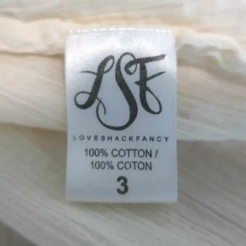 LoveShackFancy Schulterfreies Top mit Stickereinsatz und Quasten in Ecru-Gaze Größe 3