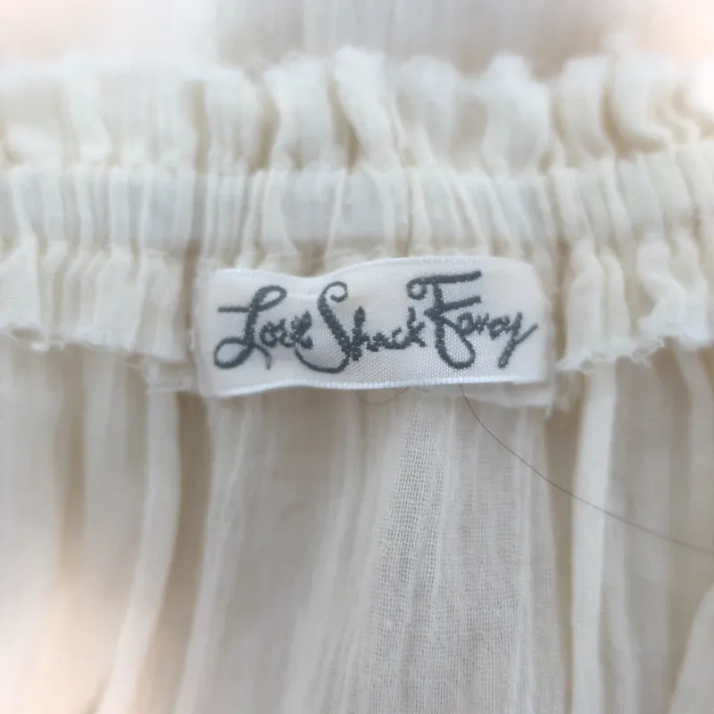 LoveShackFancy Schulterfreies Top mit Stickereinsatz und Quasten in Ecru-Gaze Größe 3