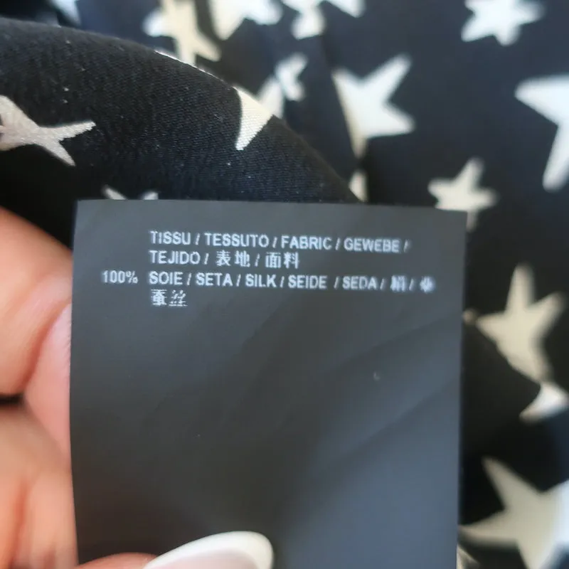 Saint Laurent Sternmuster Seidenbluse Schwarz/Weiß Größe 42 Langarmbluse
